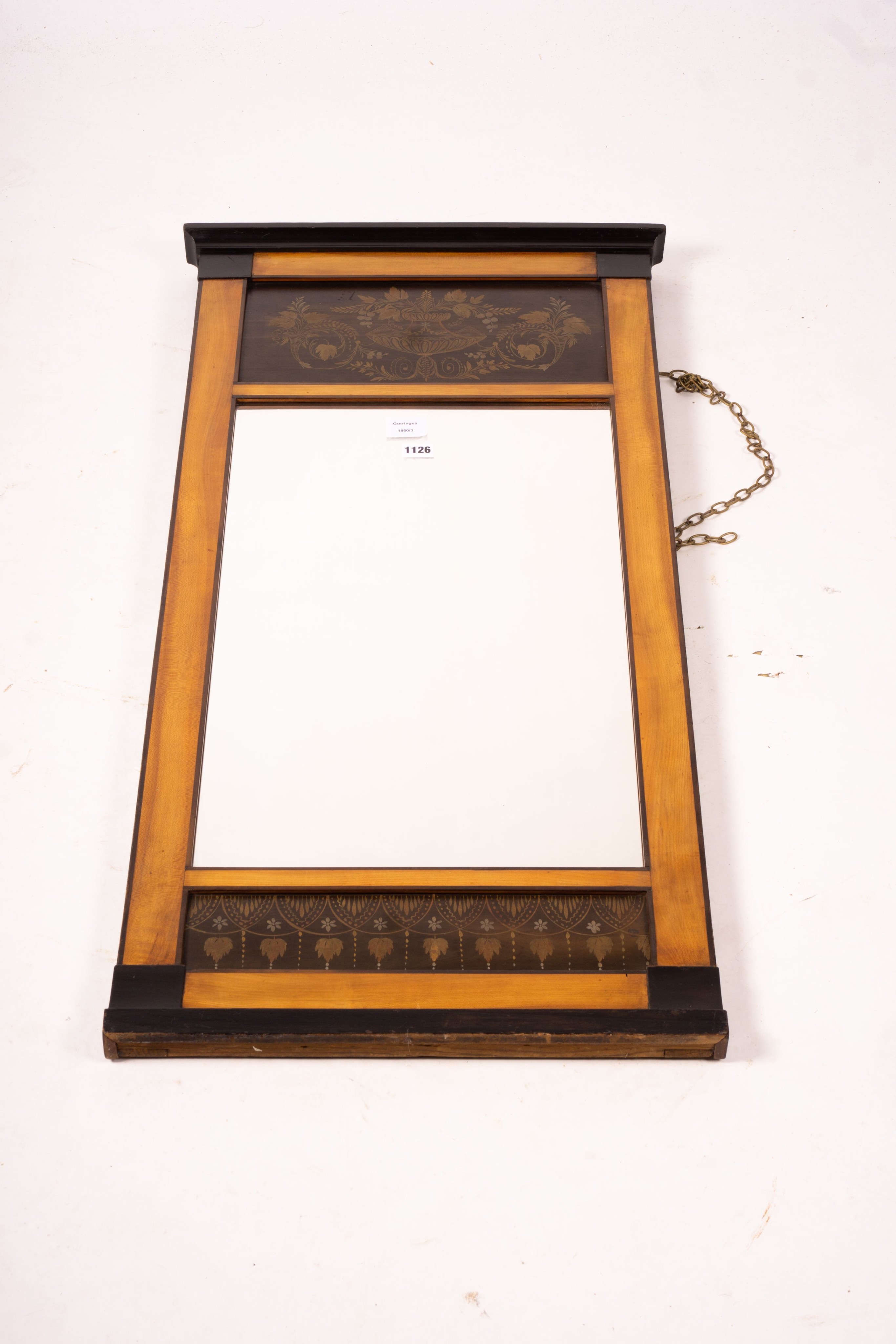 A Biedermeier style mirror with stencil decoration, width 51cm, height 109cm